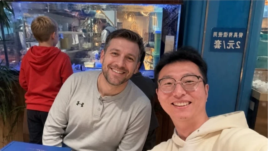 Our local host with an overseas guest in a Chinese restaurant.